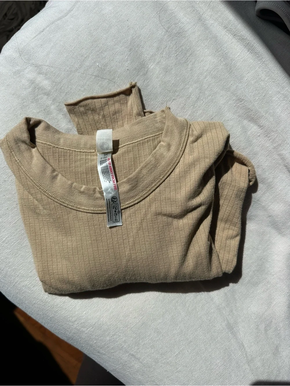 Free People Ribbed Long-Sleeve Crewneck Top in Beige